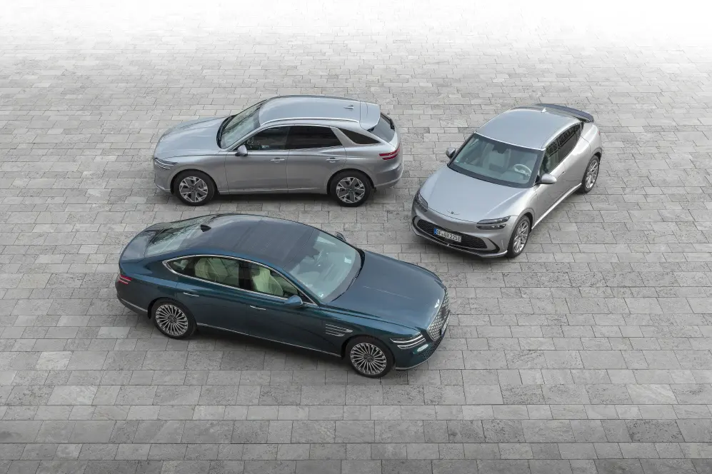 제네시스 GV60 마그마, 올 7월 영국 굿우드 페스티벌 데뷔할까? 3 a group of genesis cars parked on a stone surface