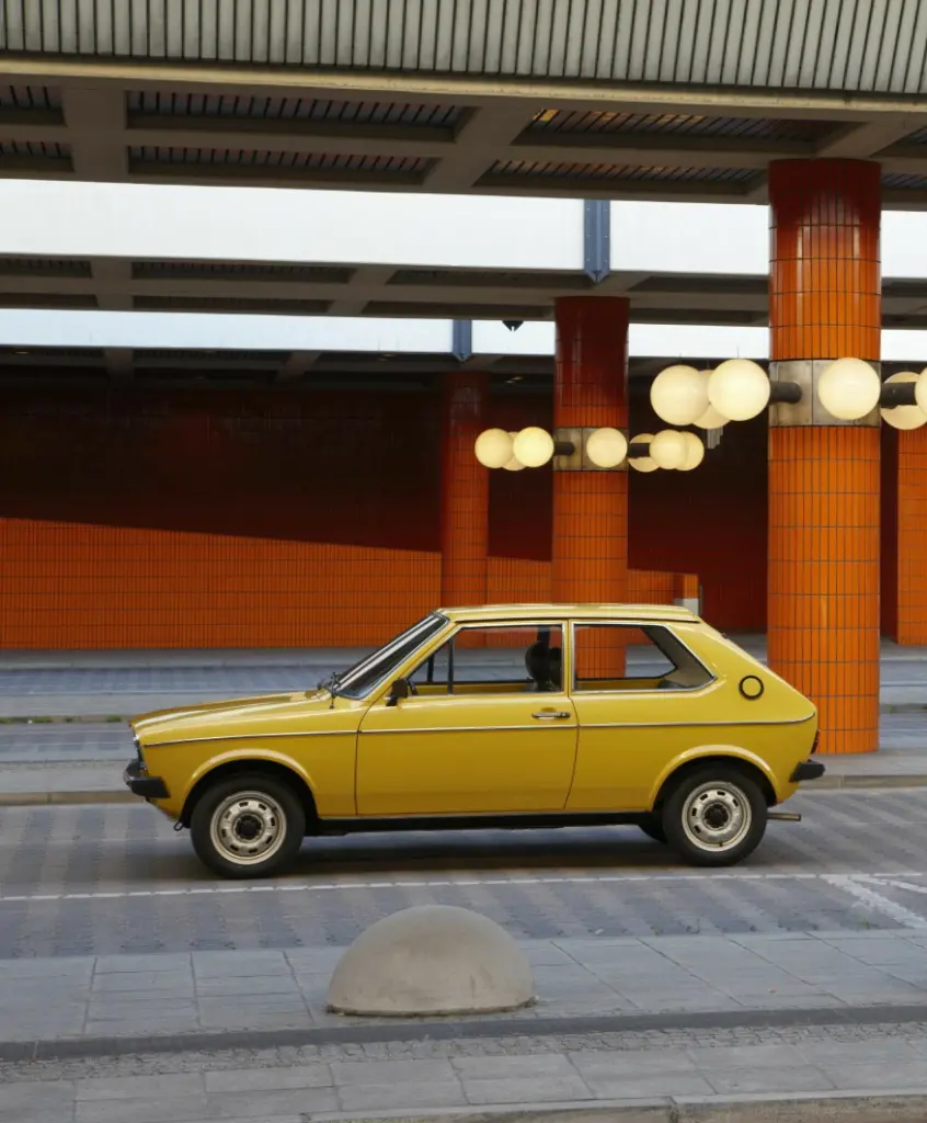 a yellow car on the street