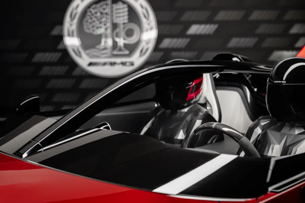 Mercedes‑AMG PureSpeed concept a person in a red sports car