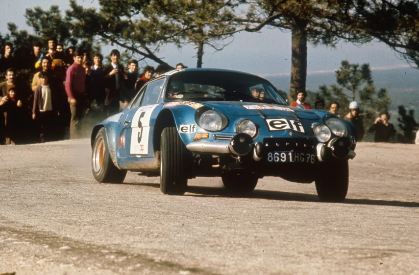 Alpine Renault A110 Berlinette https://mobilityground.com/wp-content/uploads/2025/09/Marie-Claude-Beaumont-and-Lella-Lombardi-with-Alpine-Renault-A441-C-Le-Mans-prototype.webp