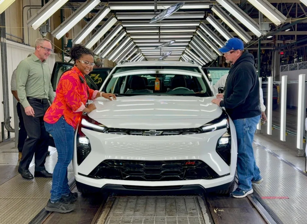 GM employees and a 2027 Bolt at Fairfax Assembly GM directs major investment in local workforce to launch three new vehicles