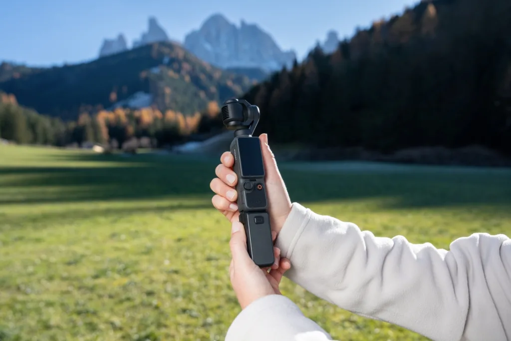 Osmo Pocket 4 Hiking Battery Handle https://mobilityground.com/wp-content/uploads/2026/04/Osmo-Pocket-4_Vlogging_Mic-Mini-TX-white.webp