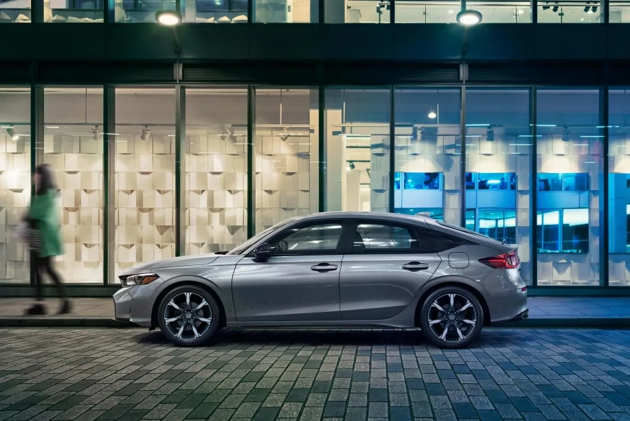 01 2027 Honda Civic Sedan Sport Touring Hybrid https://mobilityground.com/wp-content/uploads/2026/10/202-Honda-Civic-Hatchback-Sport-Touring-Hybrid.webp